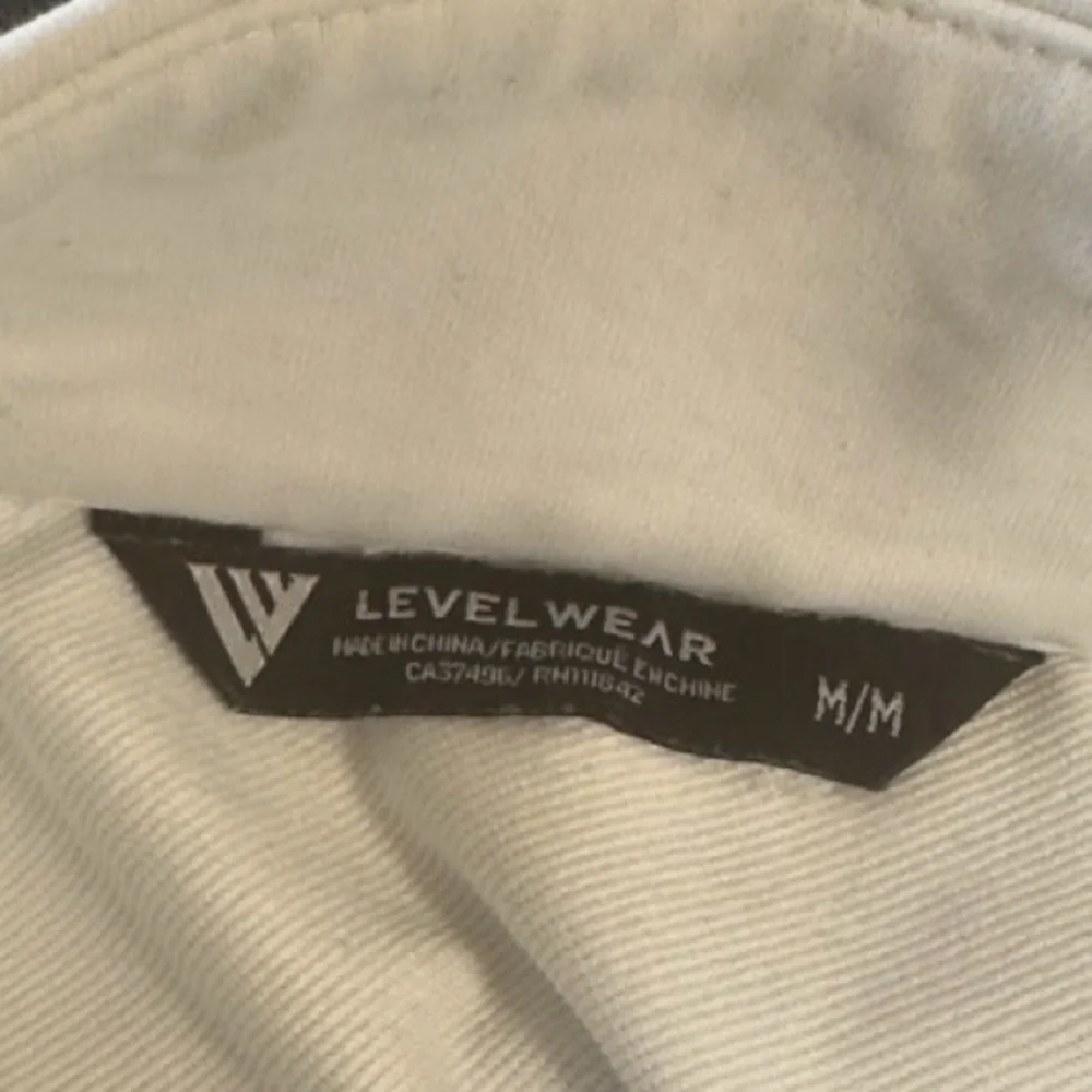 Levelwear‎ White and Black Striped Quarter-Zip Pullover Medium